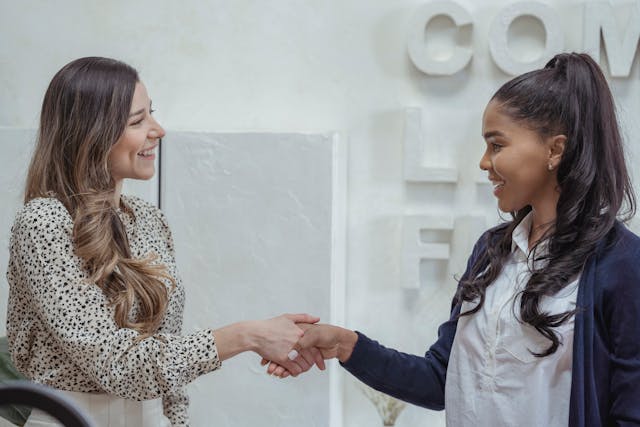 two people shaking hands